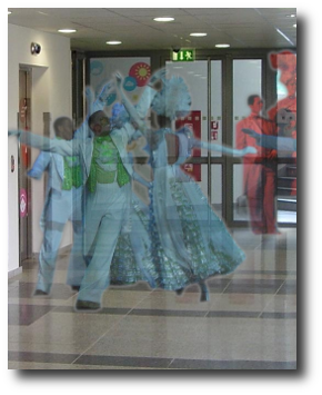 A little after midnight, the muertos show up. They’re always in their Sunday best, dressed to the nines, as they say, in pinstriped suits and fancy dresses. Artwork : This photo of Cuban ghosts dancing in a hospital is a mashup of two images, one in the  and one using the .