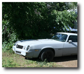 My son, Billy, had this Camaro that he had been working on for nearly two years. It was his pride and joy, and it almost ran. Artwork from and used under a license.