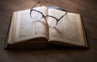 Glasses on an opened book